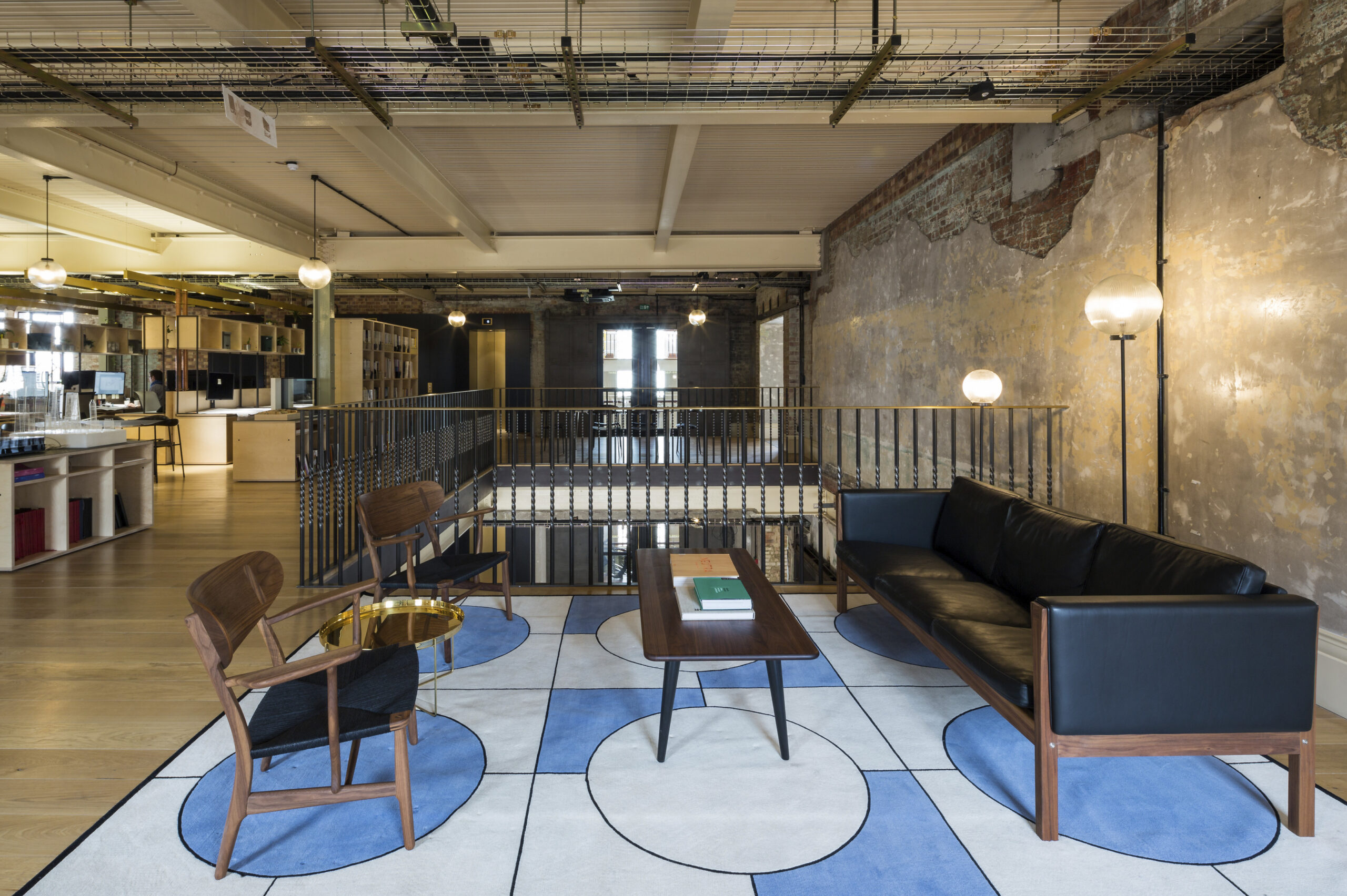 Comfortable leather chairs in one for the breakout spaces, off our co-working area.